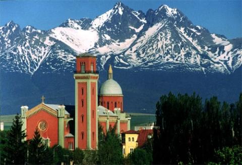 The new church in Kezmarok with the High Tatra landscape